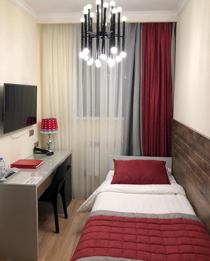 Grace Point Hotel Astana Chambre photo