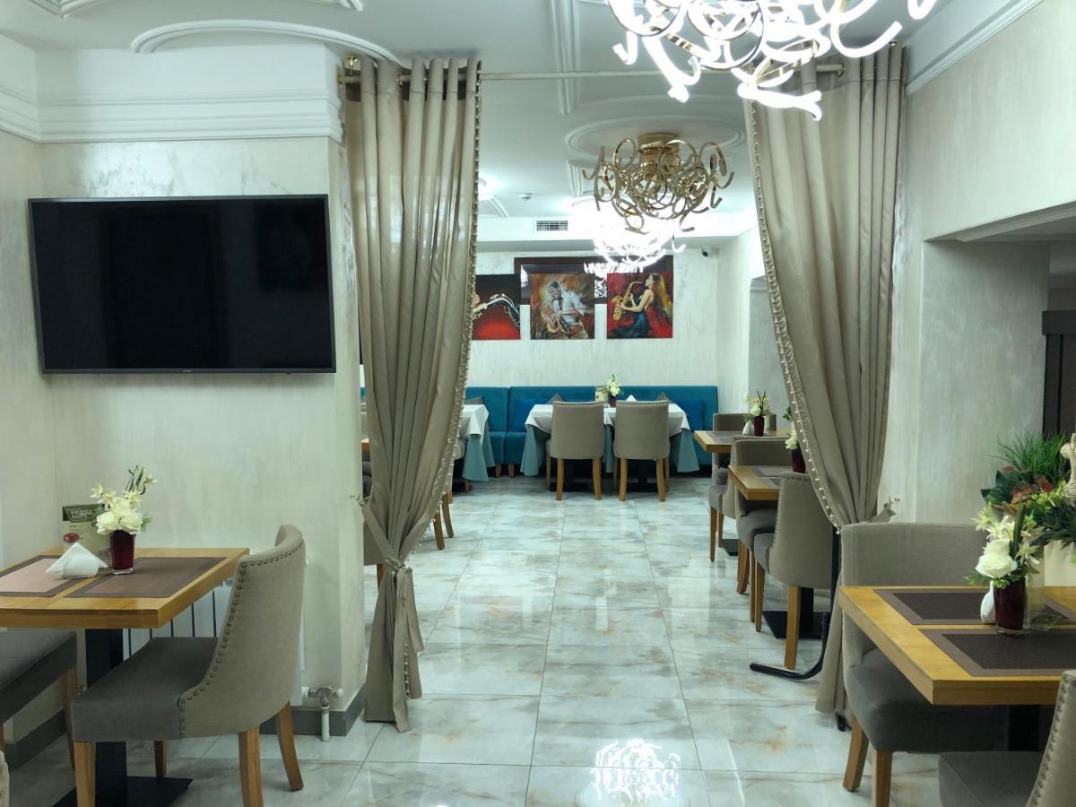 Grace Point Hotel Astana Chambre photo