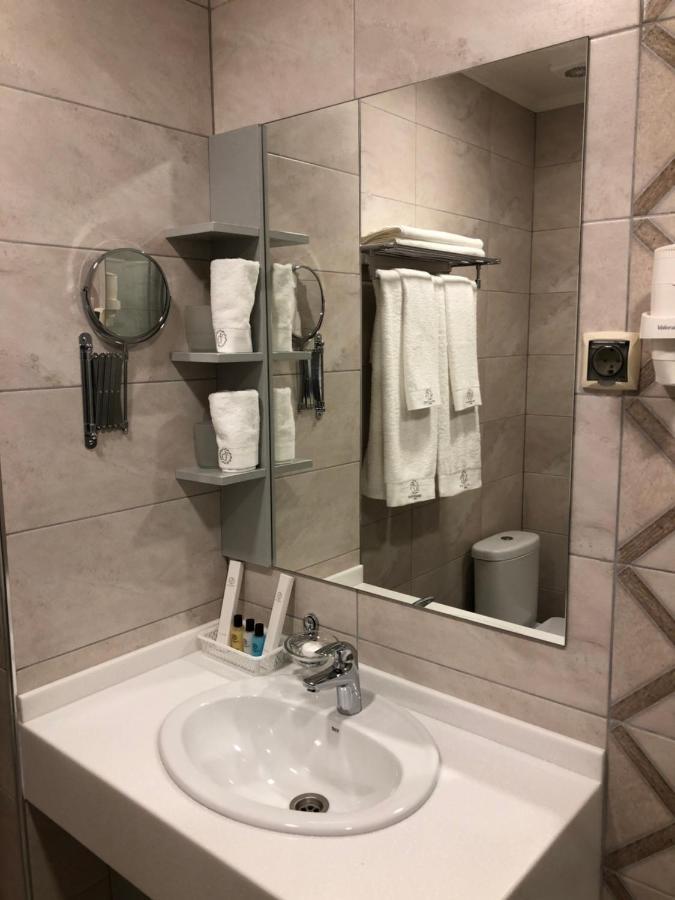 Grace Point Hotel Astana Chambre photo